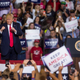 Donald Trump takes the podium before speaking during a political rally on July 17, 2019, in Greenville, N.C., where supporters chanted “Send her back” in reference to frequent Trump critic Rep. Ilhan Omar.